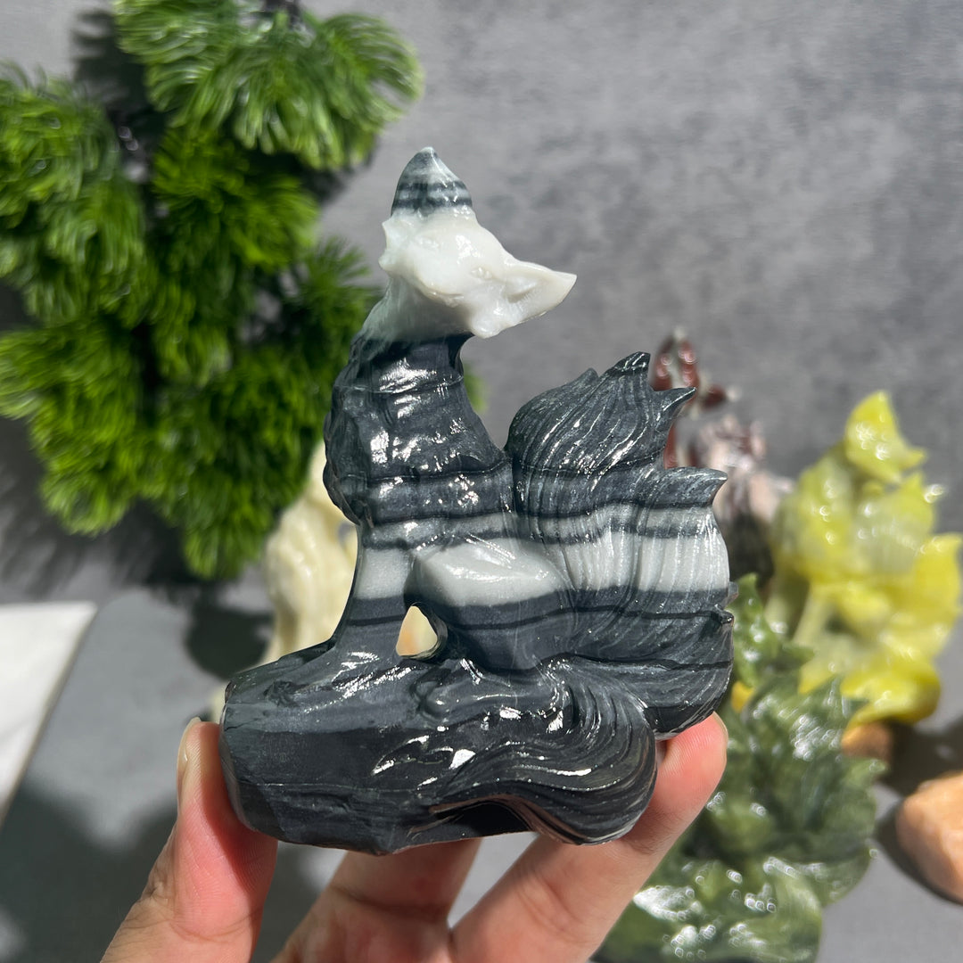 Sonne und Mond aus goldenem/silbernem Obsidian