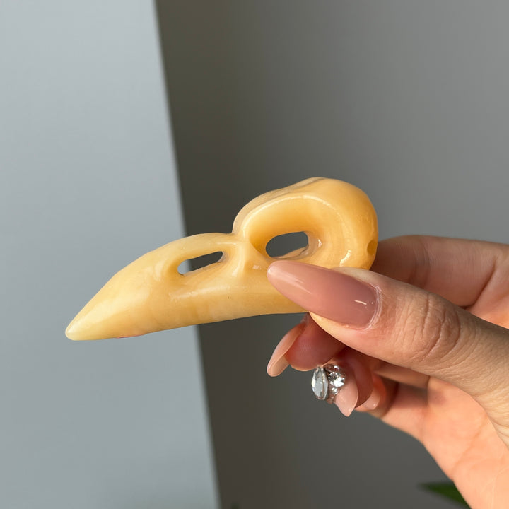Yellow Calcite Crow Skull