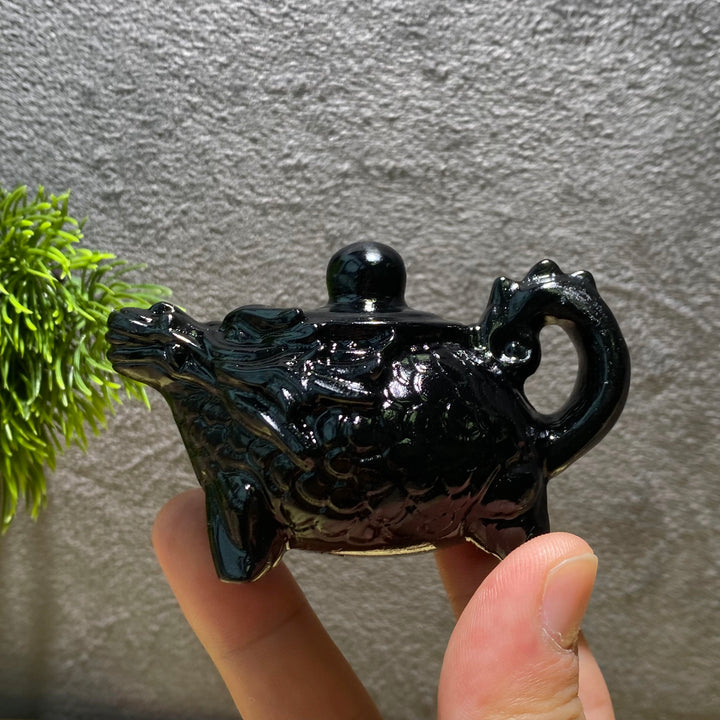 Sonne und Mond aus goldenem/silbernem Obsidian