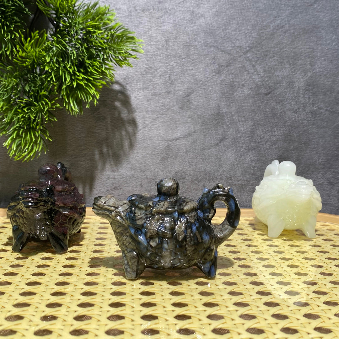 Sonne und Mond aus goldenem/silbernem Obsidian