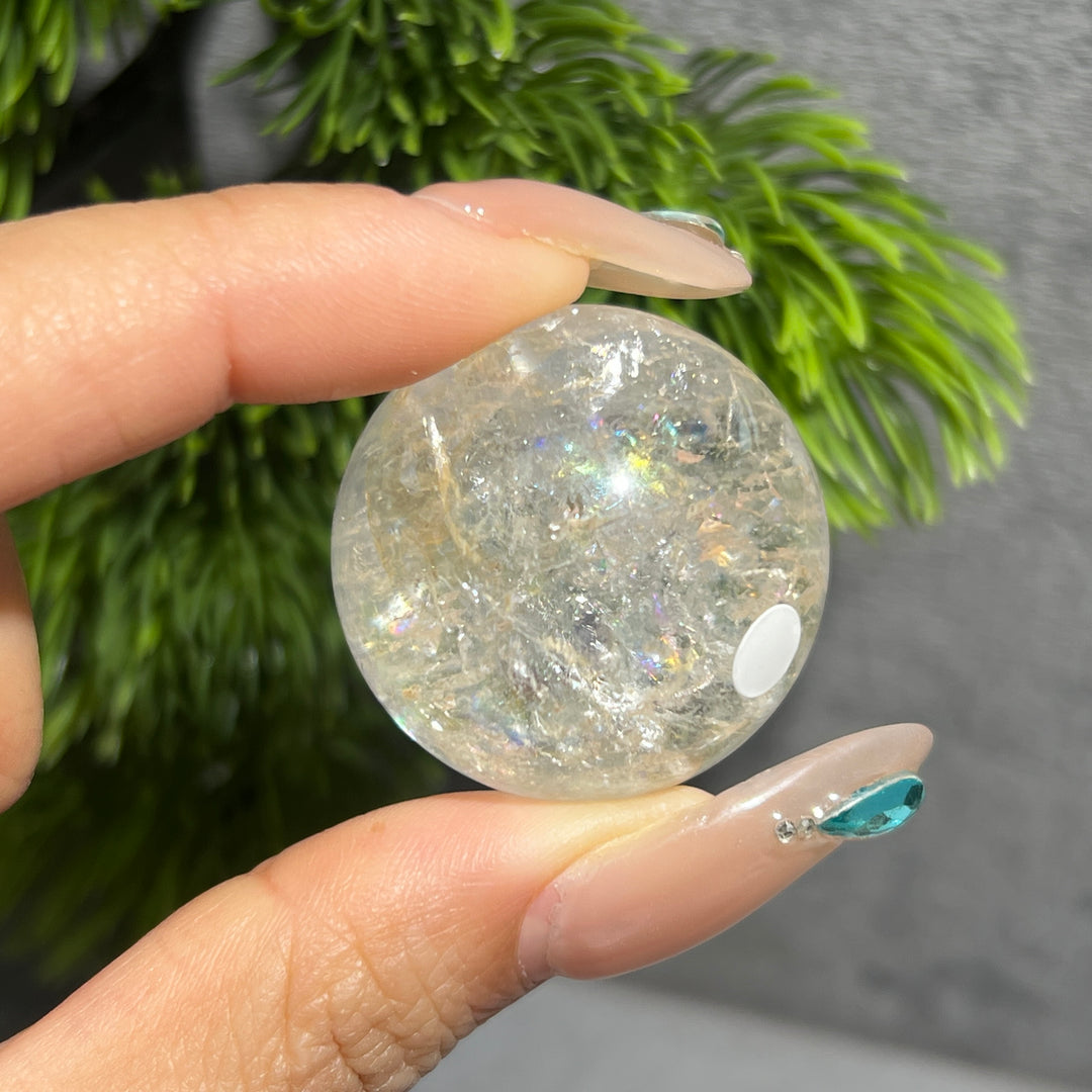 Petroleum Included Quartz Sphere