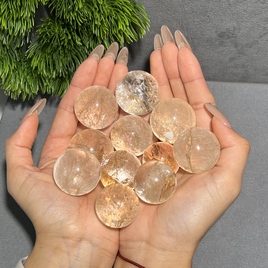 Petroleum Included Quartz Sphere