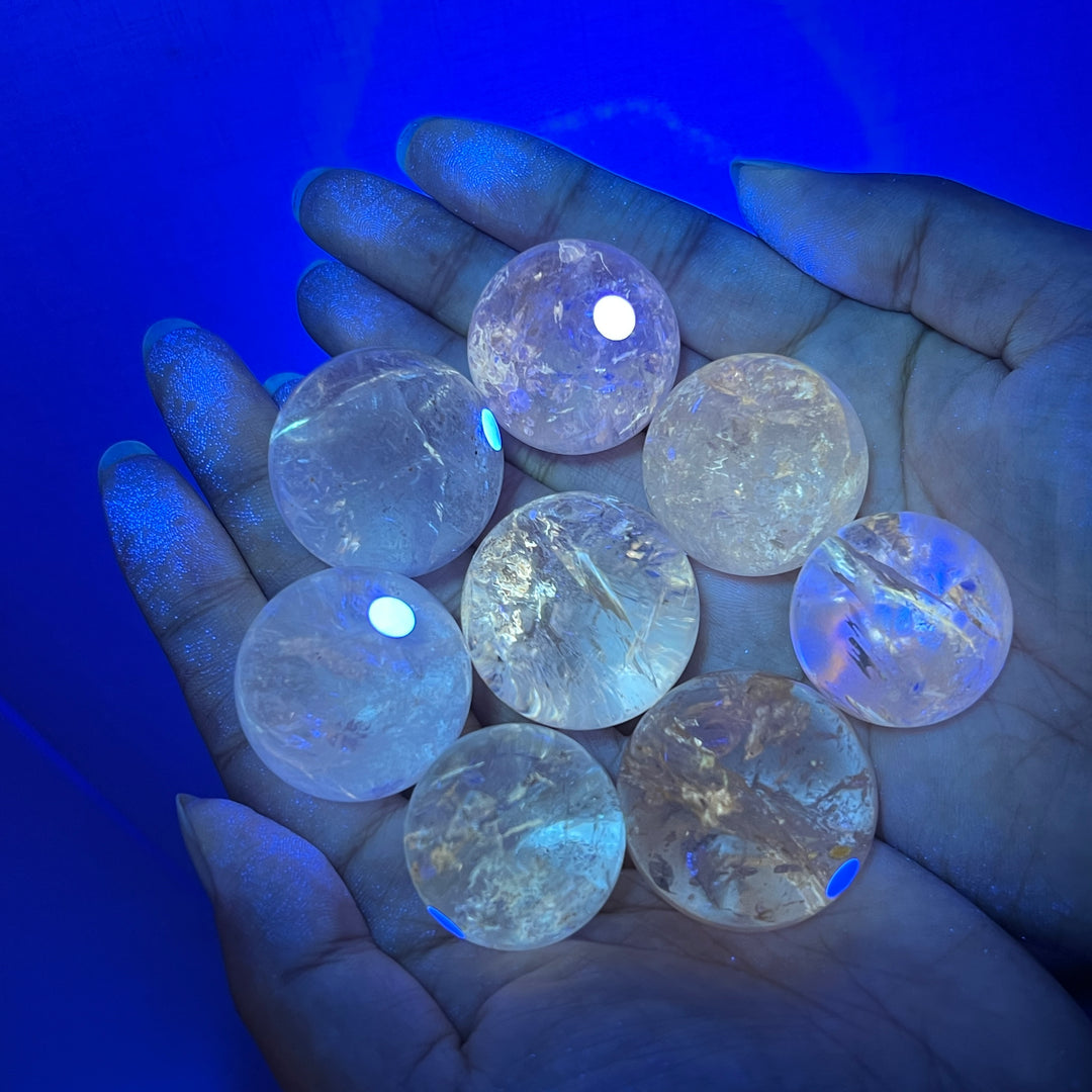 Petroleum Included Quartz Sphere
