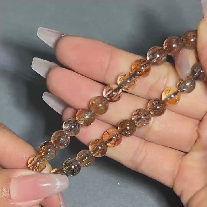 Hematite In Quartz Bracelet