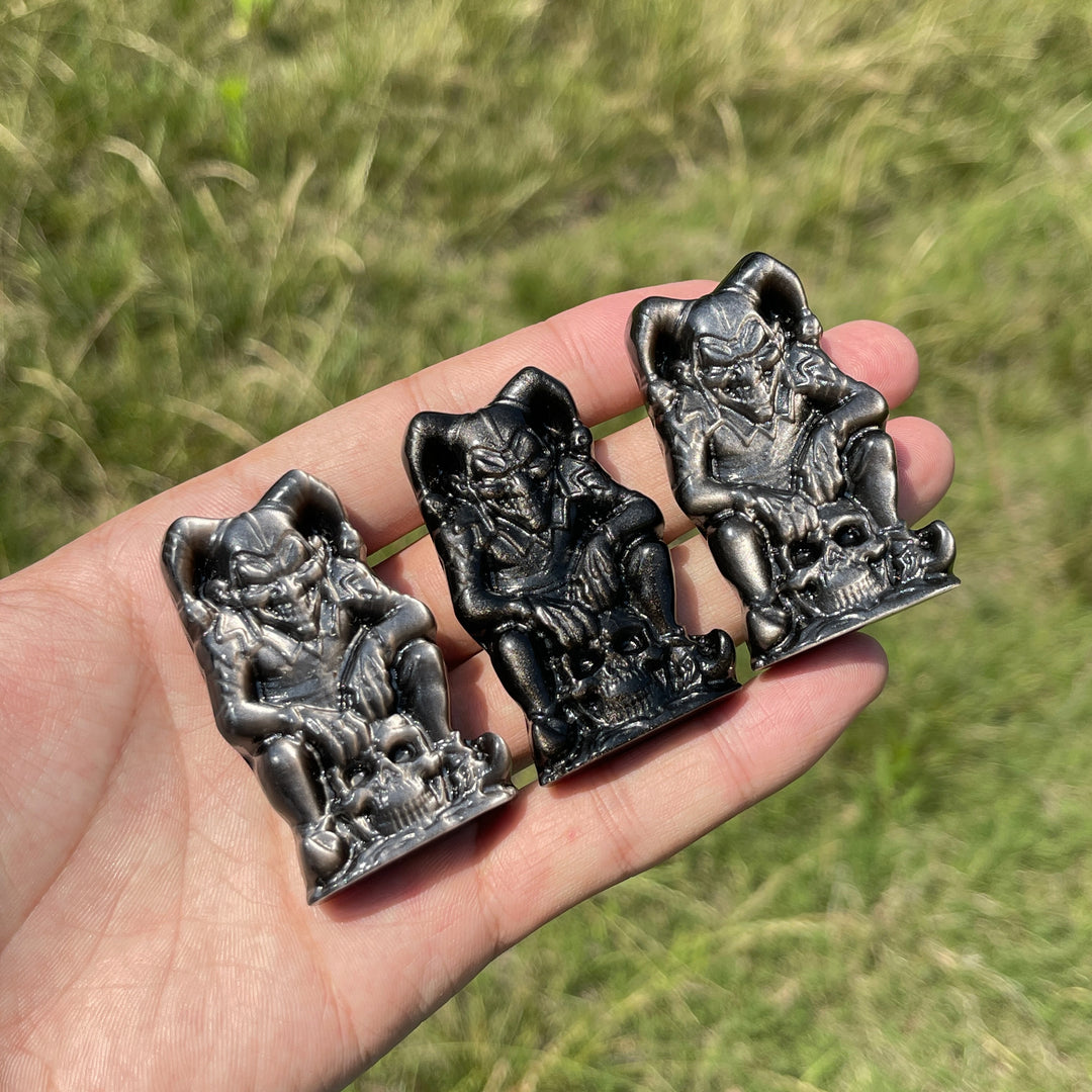 Natural Crystal Silver Obsidian Skull Clown Carving