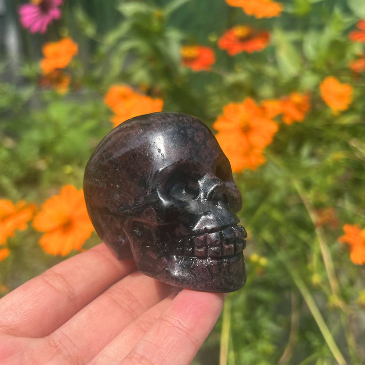 Arfvedsonite with Garnet Stone Skull