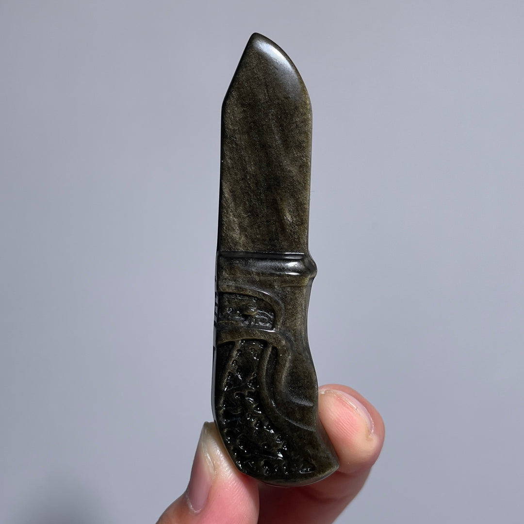 Sonne und Mond aus goldenem/silbernem Obsidian