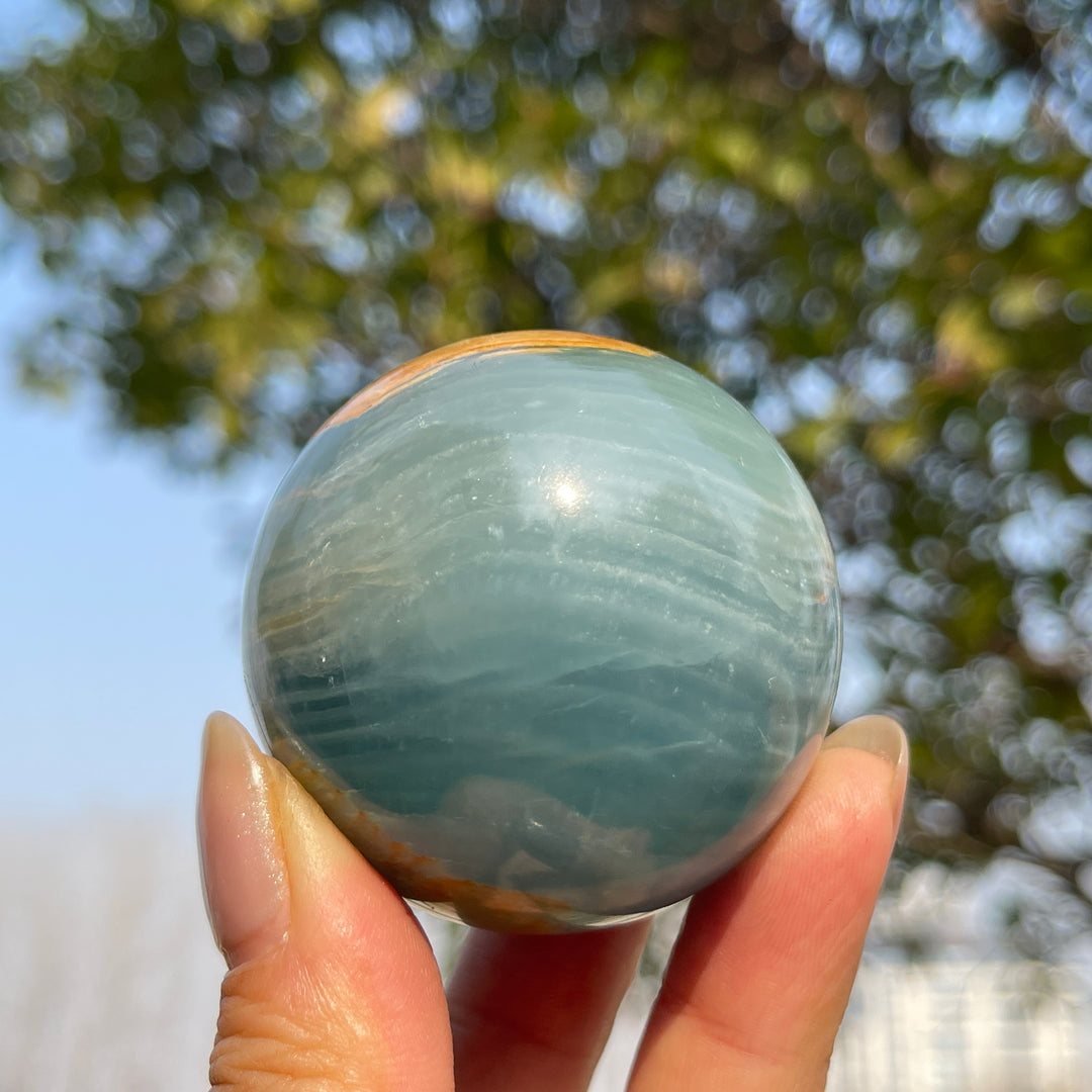 Natural Crystal Lemurian Aquatine Calcite Sphere