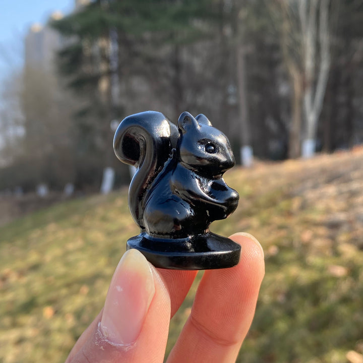 Natural Crystal Holding Pinecone Squirrel