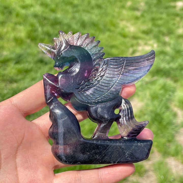 Natural Rainbow Fluorite Crystal Unicorn Carving