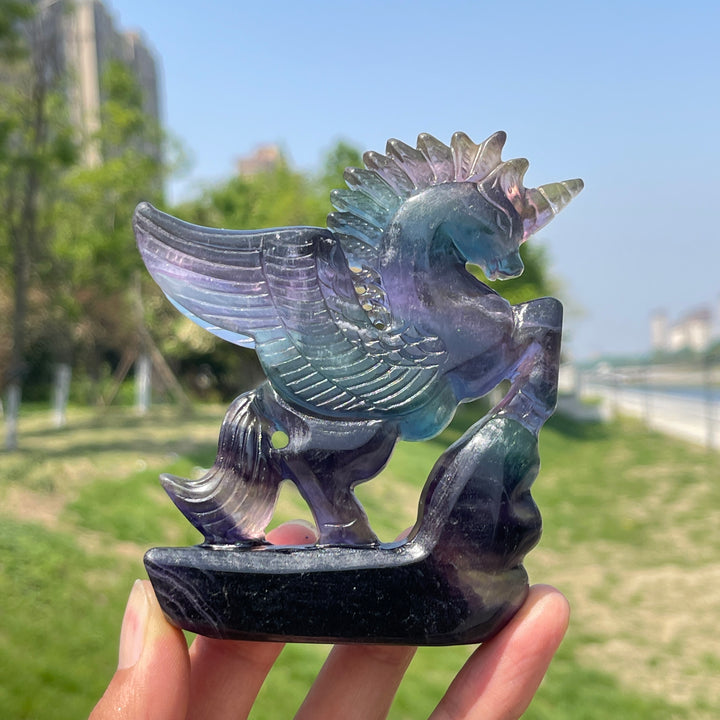 Natural Rainbow Fluorite Crystal Unicorn Carving
