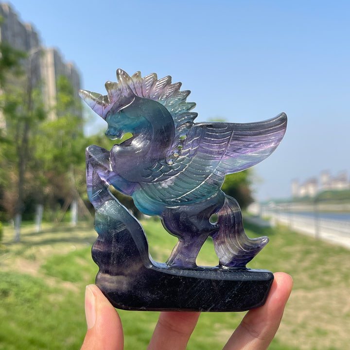 Natural Rainbow Fluorite Crystal Unicorn Carving