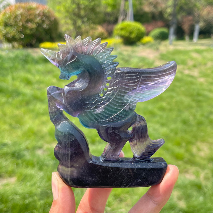 Natural Rainbow Fluorite Crystal Unicorn Carving