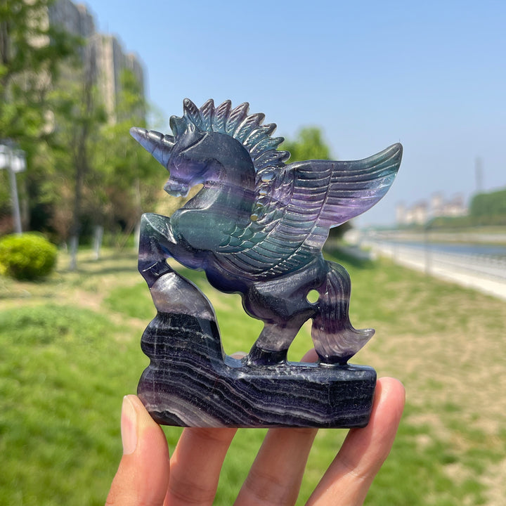 Natural Rainbow Fluorite Crystal Unicorn Carving