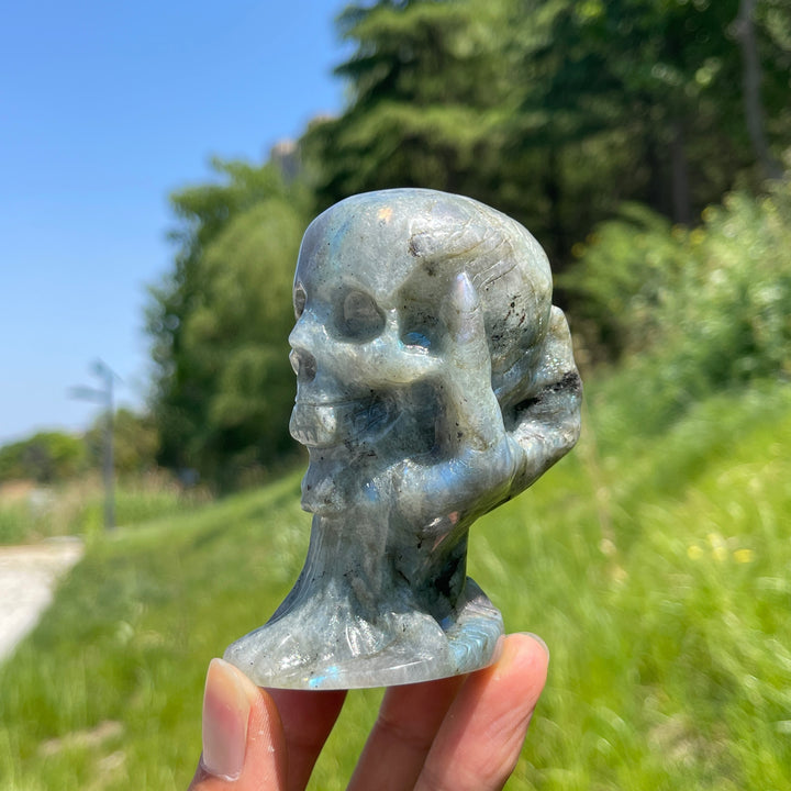 Natural Crystal Hand-Held Skull Carving