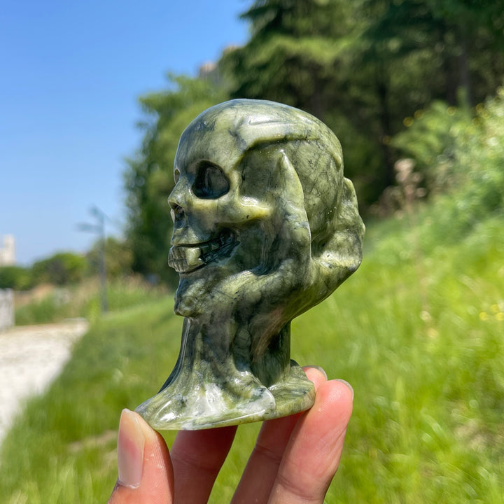 Natural Crystal Hand-Held Skull Carving
