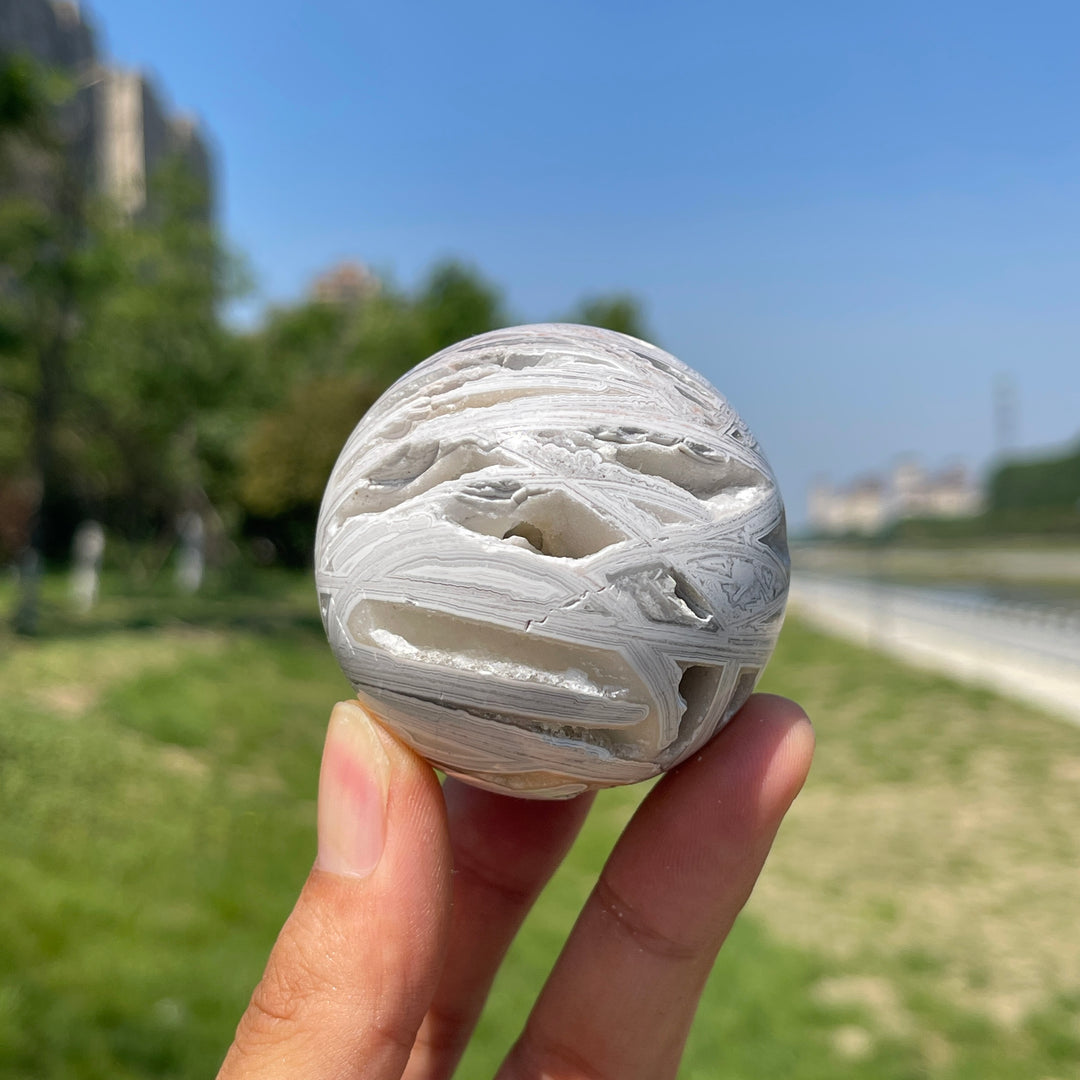 A Slightly Imperfect Natural Crystal White Mexican Agate Sphere