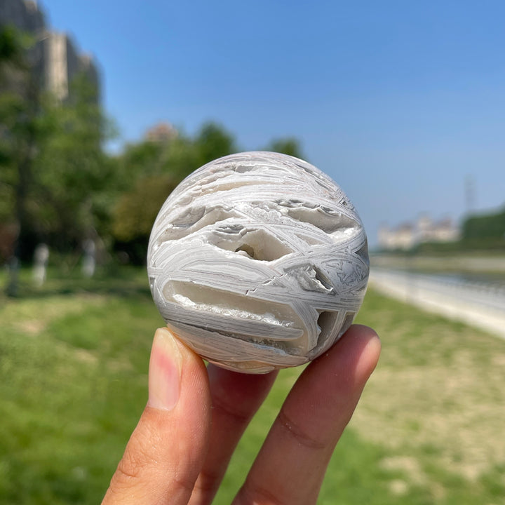 A Slightly Imperfect Natural Crystal White Mexican Agate Sphere