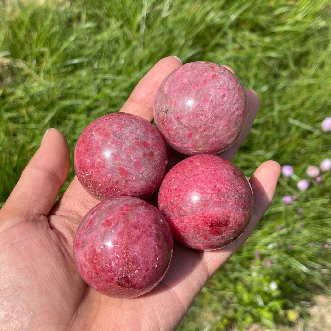 Natural Rhodonite In Quartz Sphere