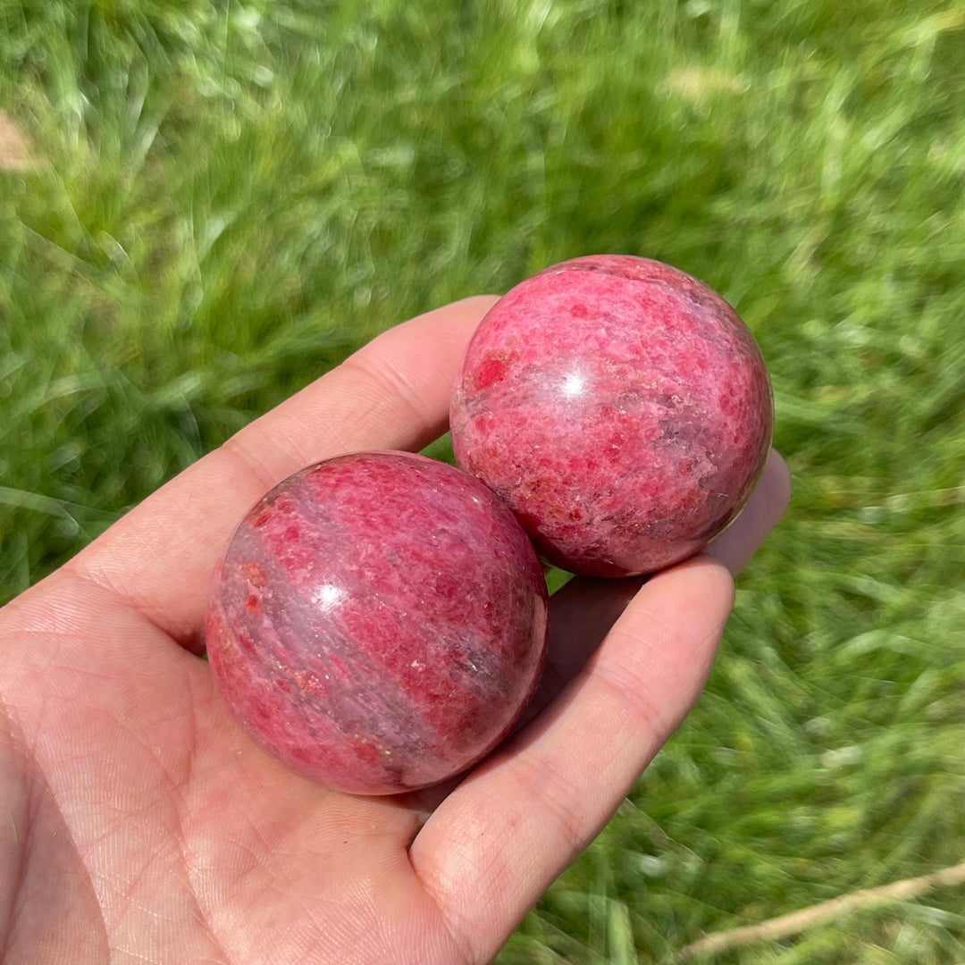 Natural Rhodonite In Quartz Sphere