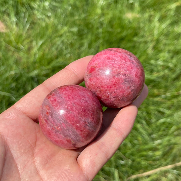 Natural Rhodonite In Quartz Sphere