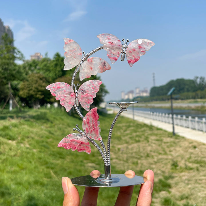 A Slightly Imperfect Natural Crystal Rhodonite In Quartz Butterfly Sphere Stand