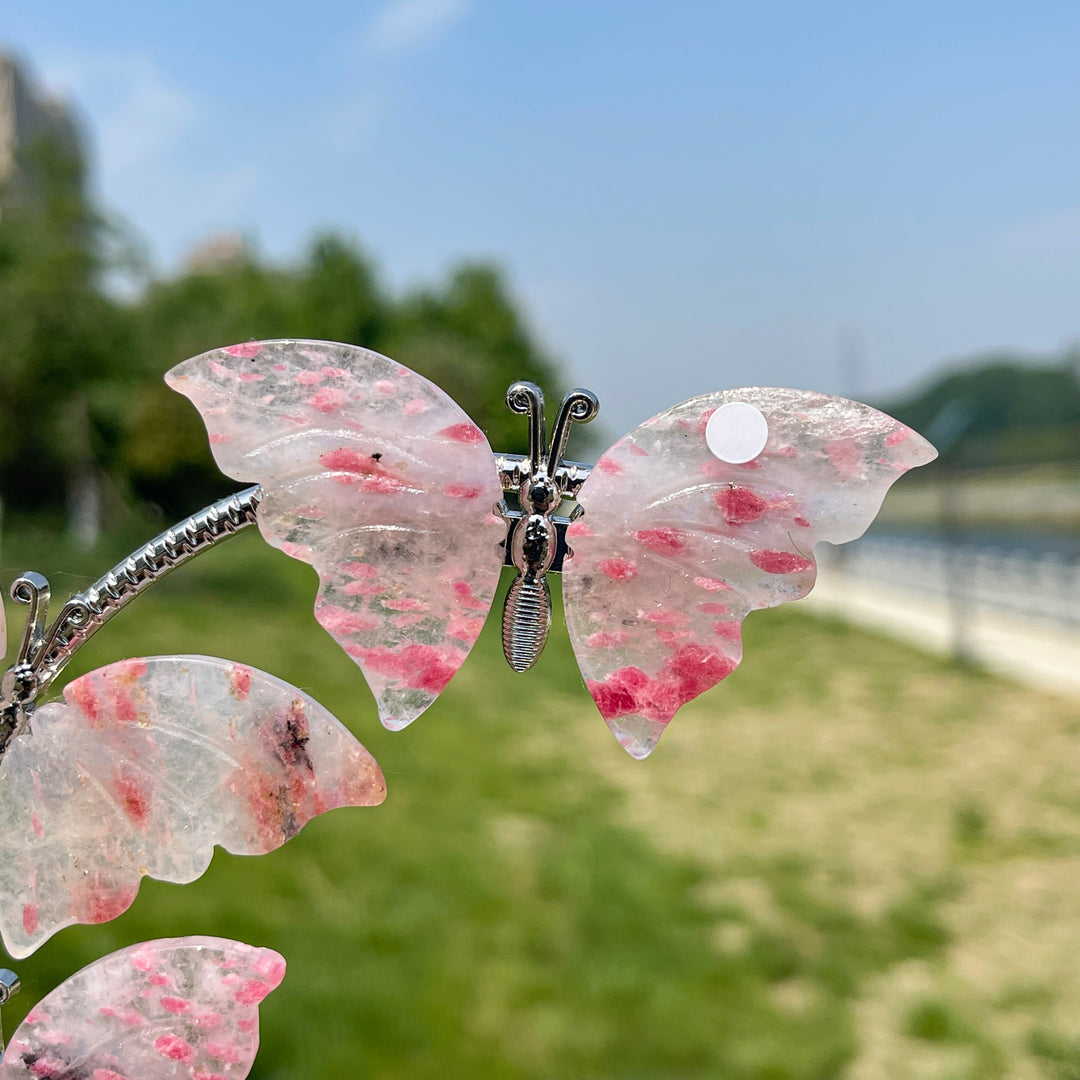 A Slightly Imperfect Natural Crystal Rhodonite In Quartz Butterfly Sphere Stand