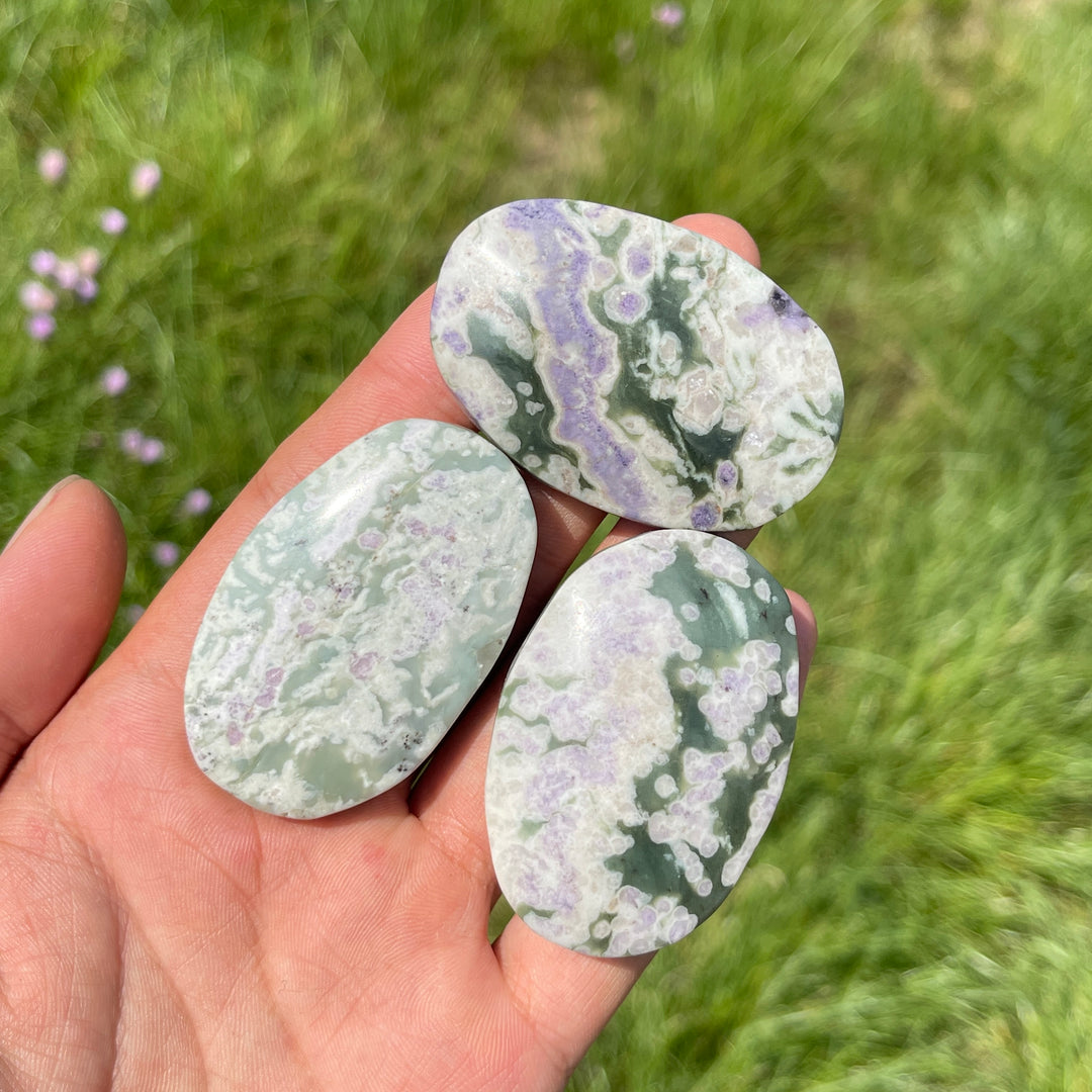 Natural Light Atlantisite Crystal Palm Stone