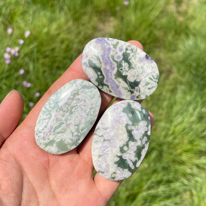 Natural Light Atlantisite Crystal Palm Stone