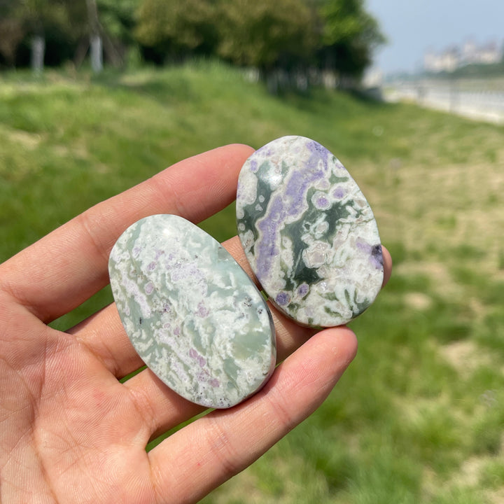 Natural Light Atlantisite Crystal Palm Stone