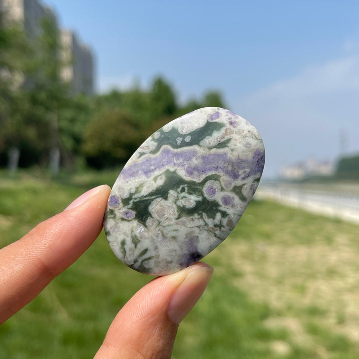 Natural Light Atlantisite Crystal Palm Stone