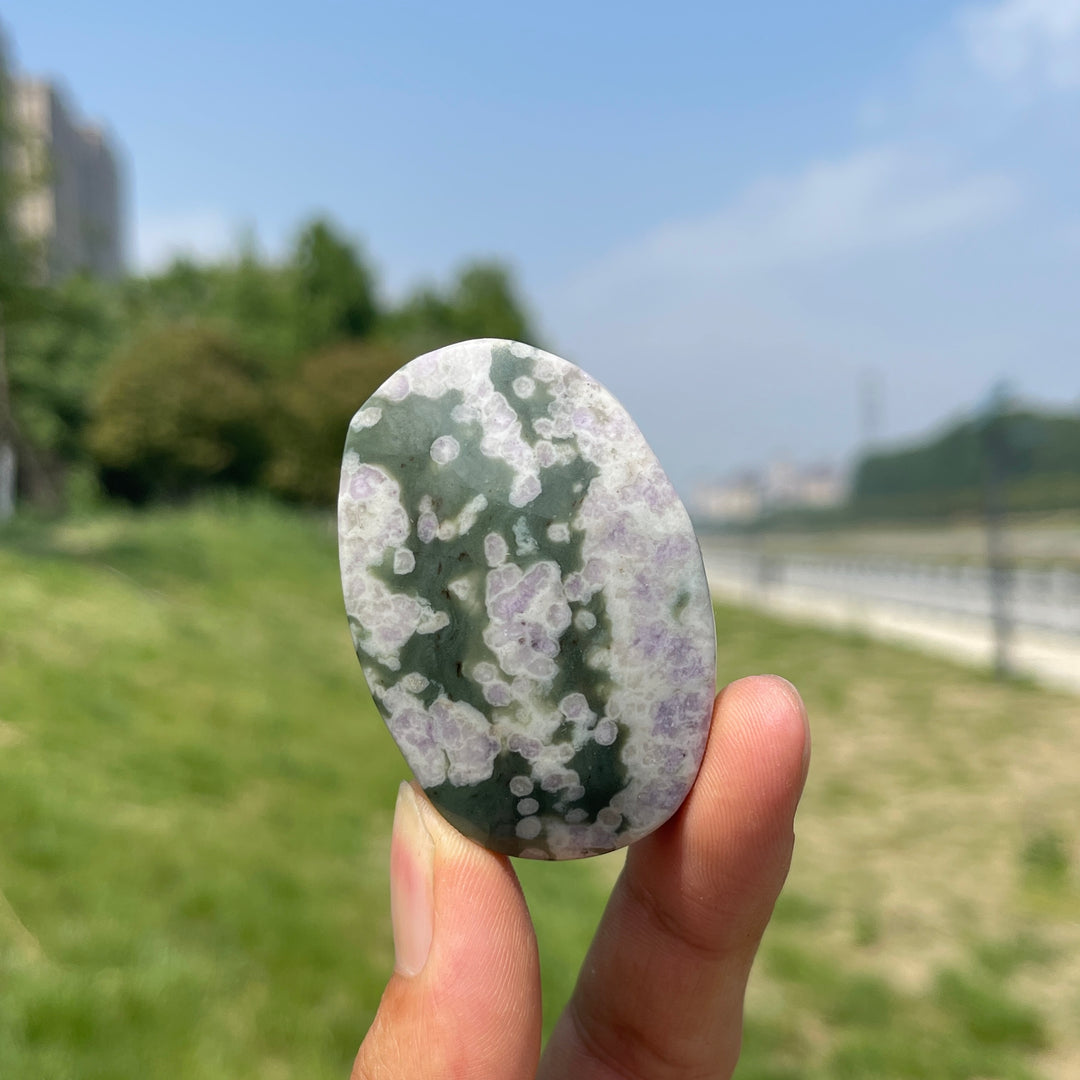 Natural Light Atlantisite Crystal Palm Stone