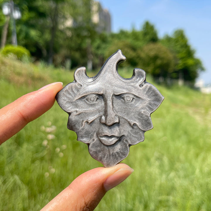 Natural Crystal Silver Obsidian Leaf Face Carving