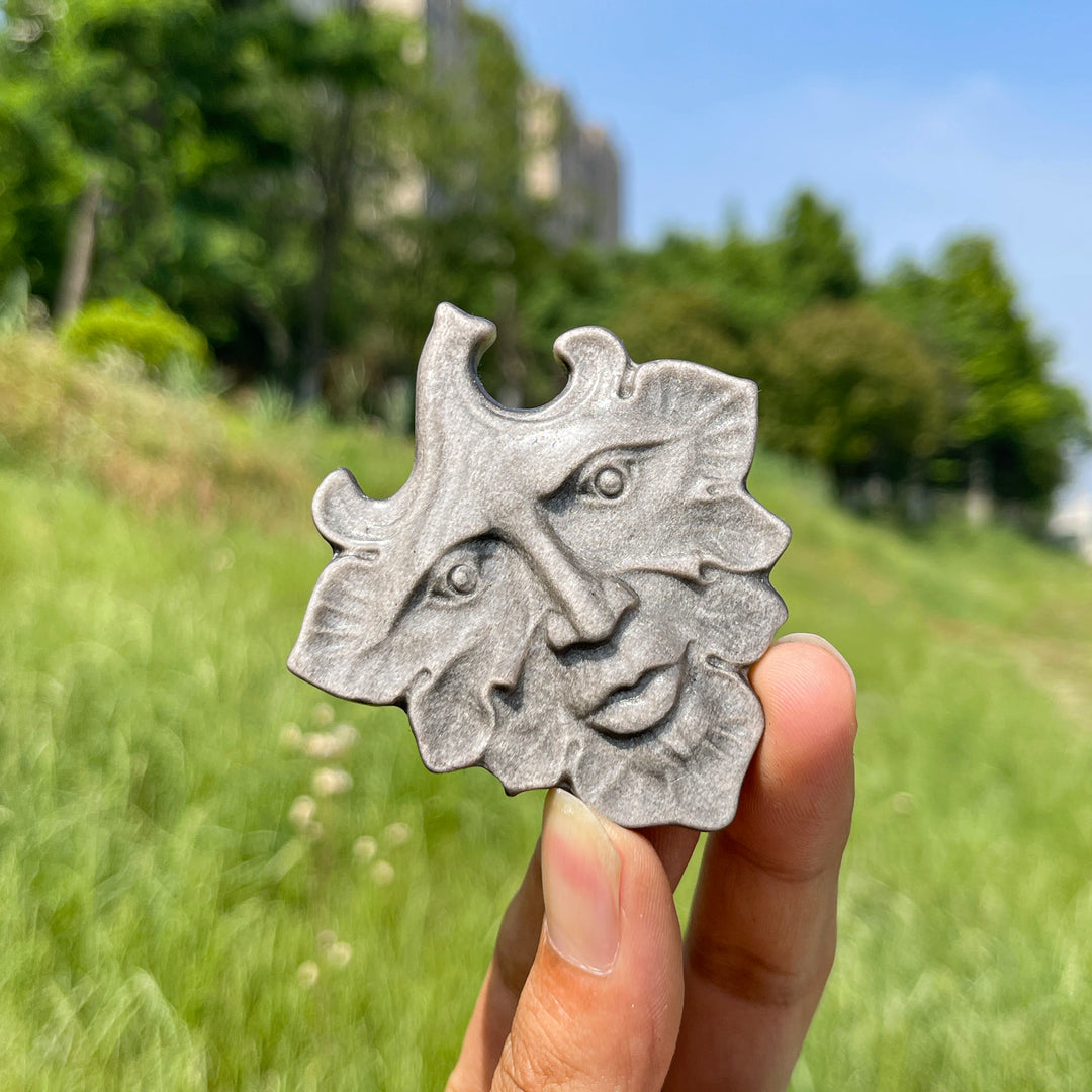 Natural Crystal Silver Obsidian Leaf Face Carving