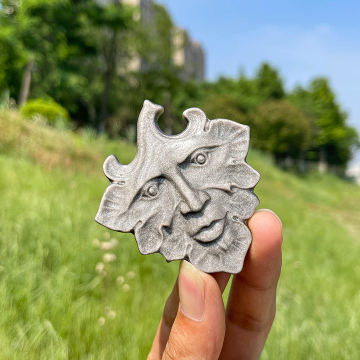 Natural Crystal Silver Obsidian Leaf Face Carving