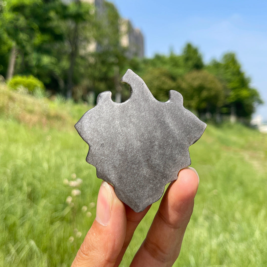 Natural Crystal Silver Obsidian Leaf Face Carving