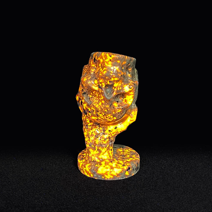 Natural Crystal Hand Holding Upside-Down Skull Carving