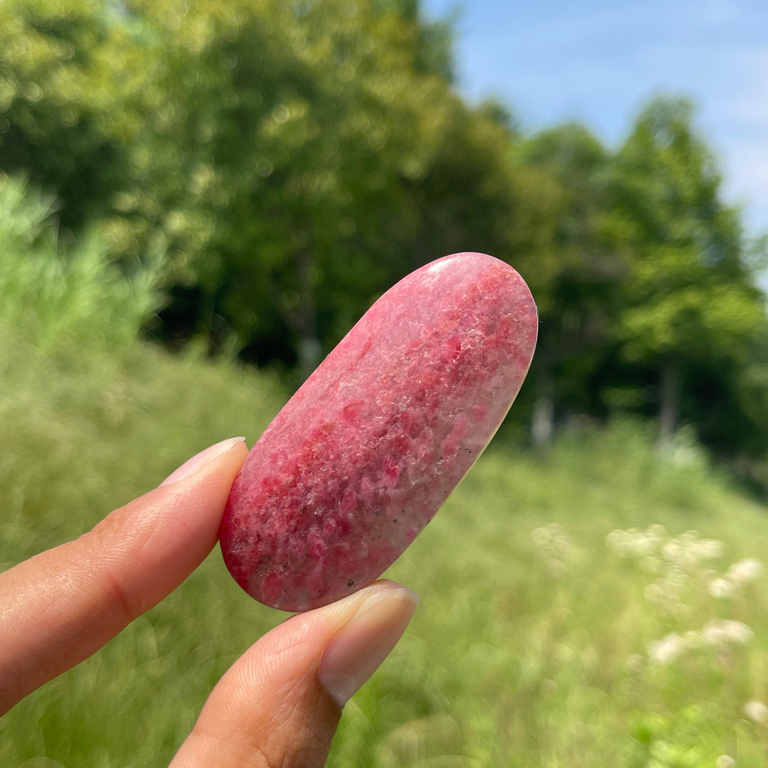 Natural Rhodonite In Quartz Palm Stone