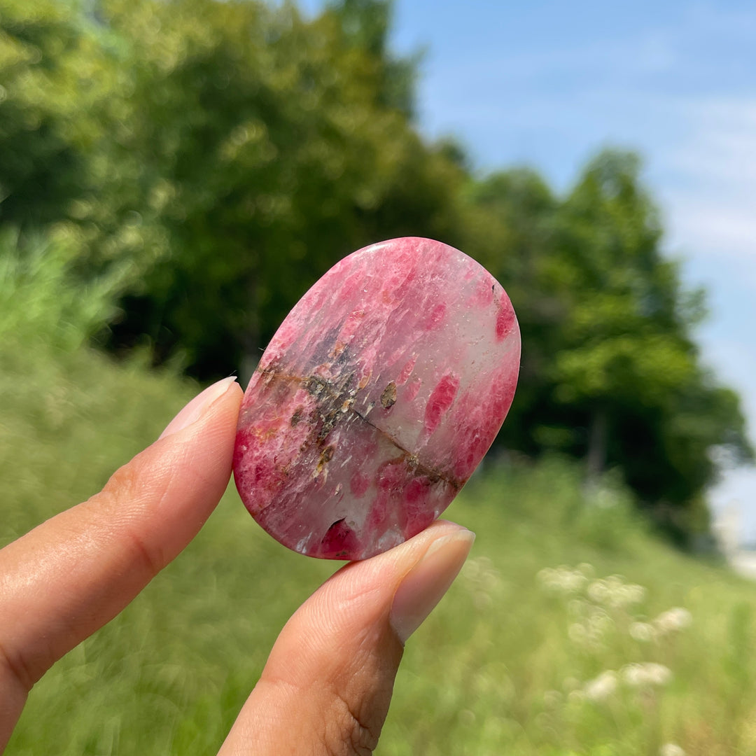 Natural Rhodonite In Quartz Palm Stone