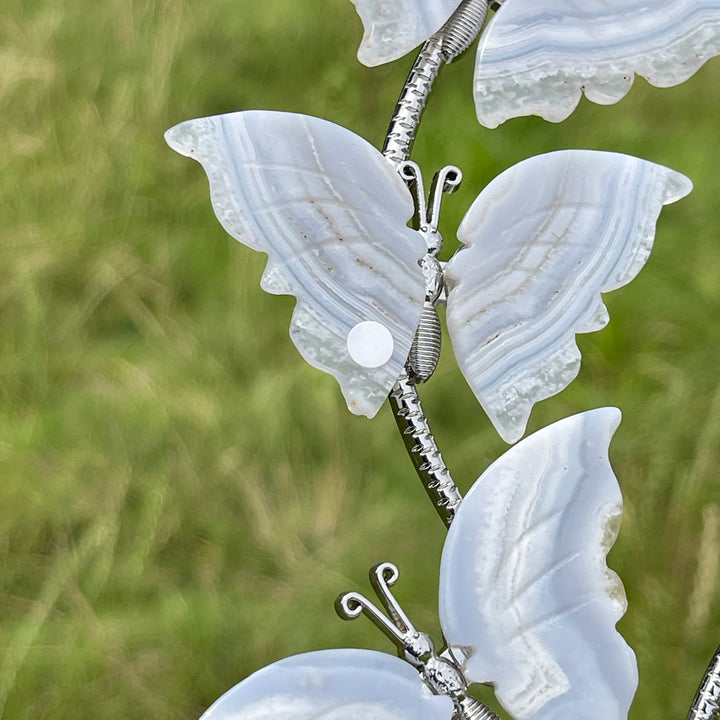A Slightly Imperfect Natural Crystal Blue Lace Agate Butterfly Sphere Stand