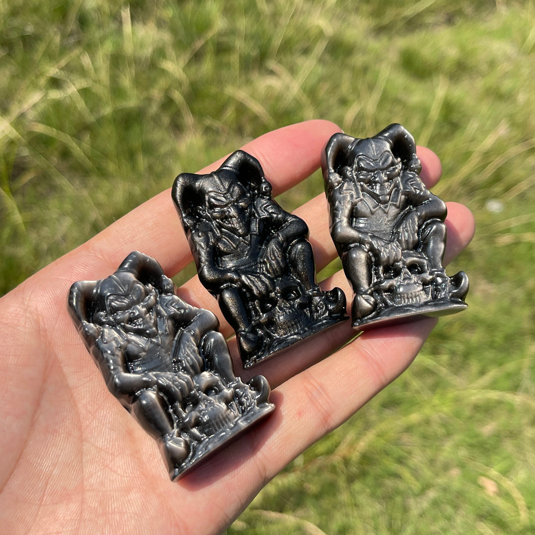 Natural Crystal Silver Obsidian Skull Clown Carving