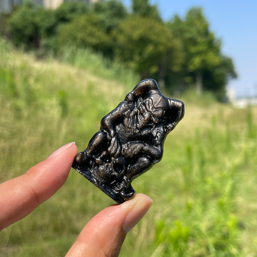 Natural Crystal Silver Obsidian Skull Clown Carving