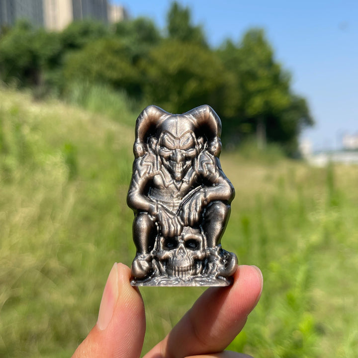 Natural Crystal Silver Obsidian Skull Clown Carving