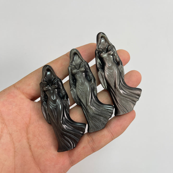A Slightly Imperfect Natural Silver Obsidian Cloaked Lady Carving