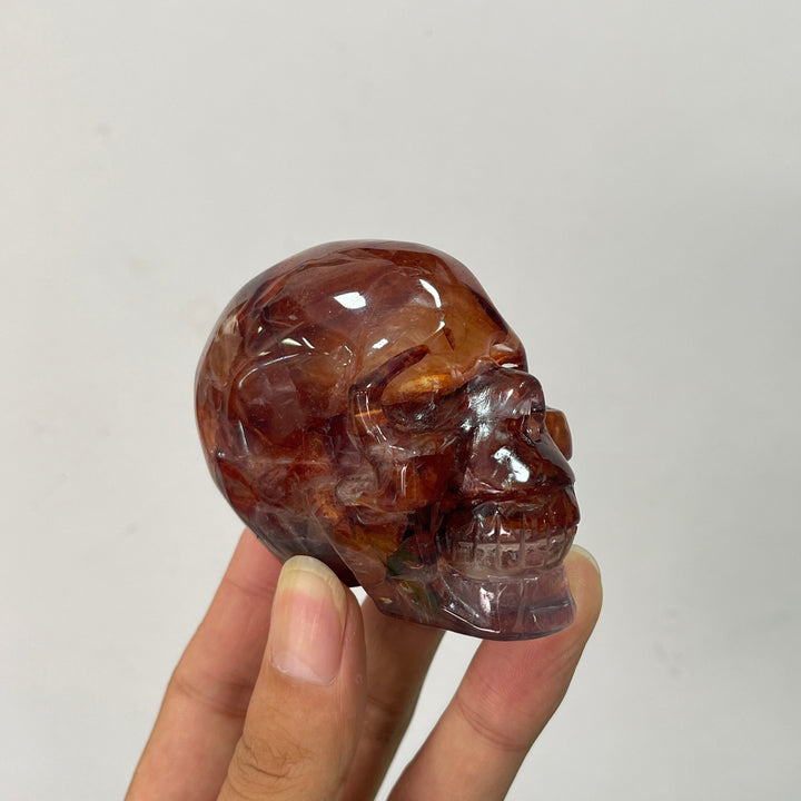 Unique,A Slightly Imperfect Natural Crystal Fire Quartz Skull Carving