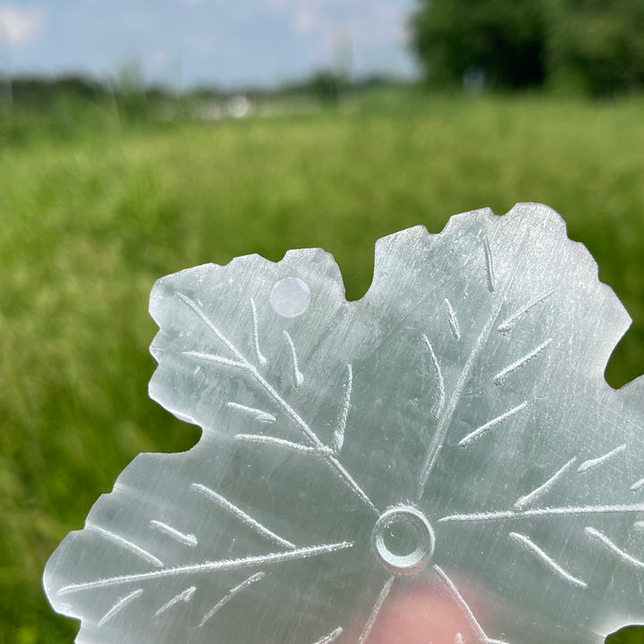 A Slightly Imperfect Natural Crystal Selenite Snowflake Carving