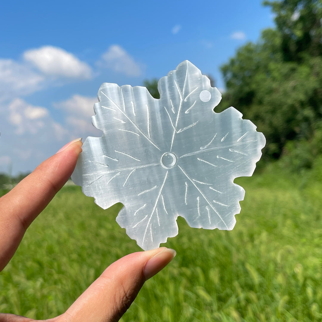 A Slightly Imperfect Natural Crystal Selenite Snowflake Carving