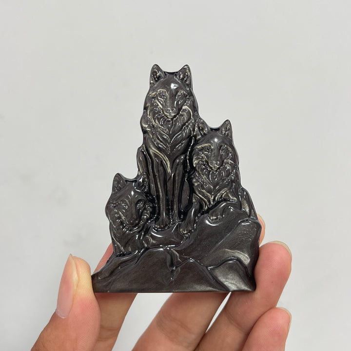 Natural Crystal Silver Obsidian Three‑Wolf Carving