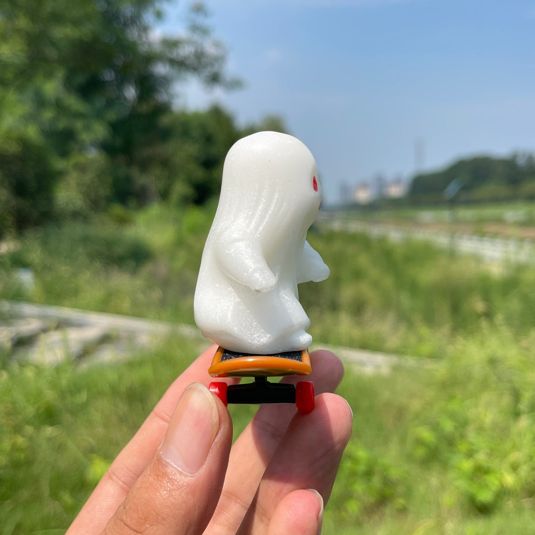 Natural Crystal White Jade Skate Ghost Carving