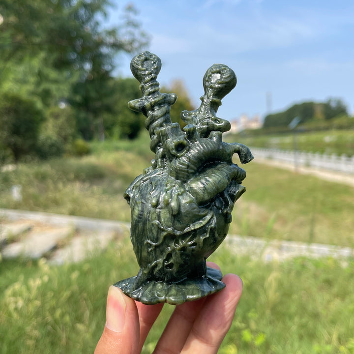 A Slightly Imperfect Natural Crystal Carving Dagger Pierced Heart